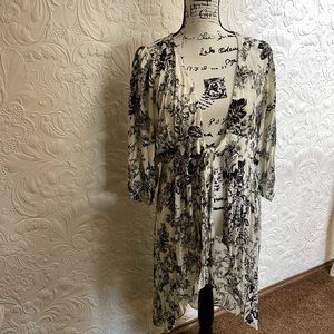 Hi/Lo tie front jacket. Black and white with touch of yellow.